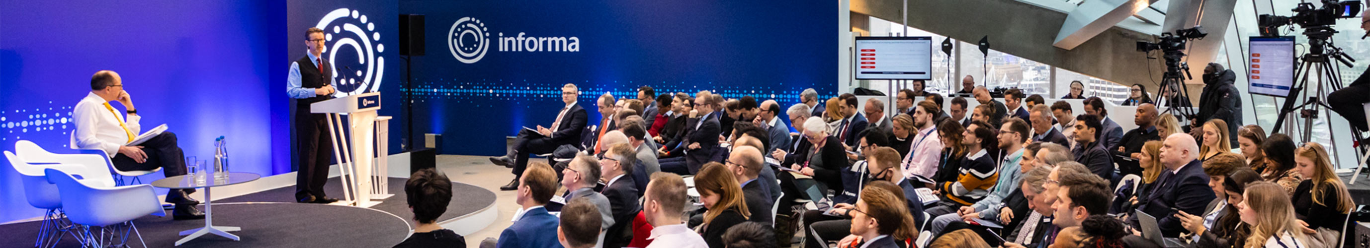 Informa investors seated at Informa's office at 240 Blackfriars office, ready to listen to a presentation at the 2019 Investors Day